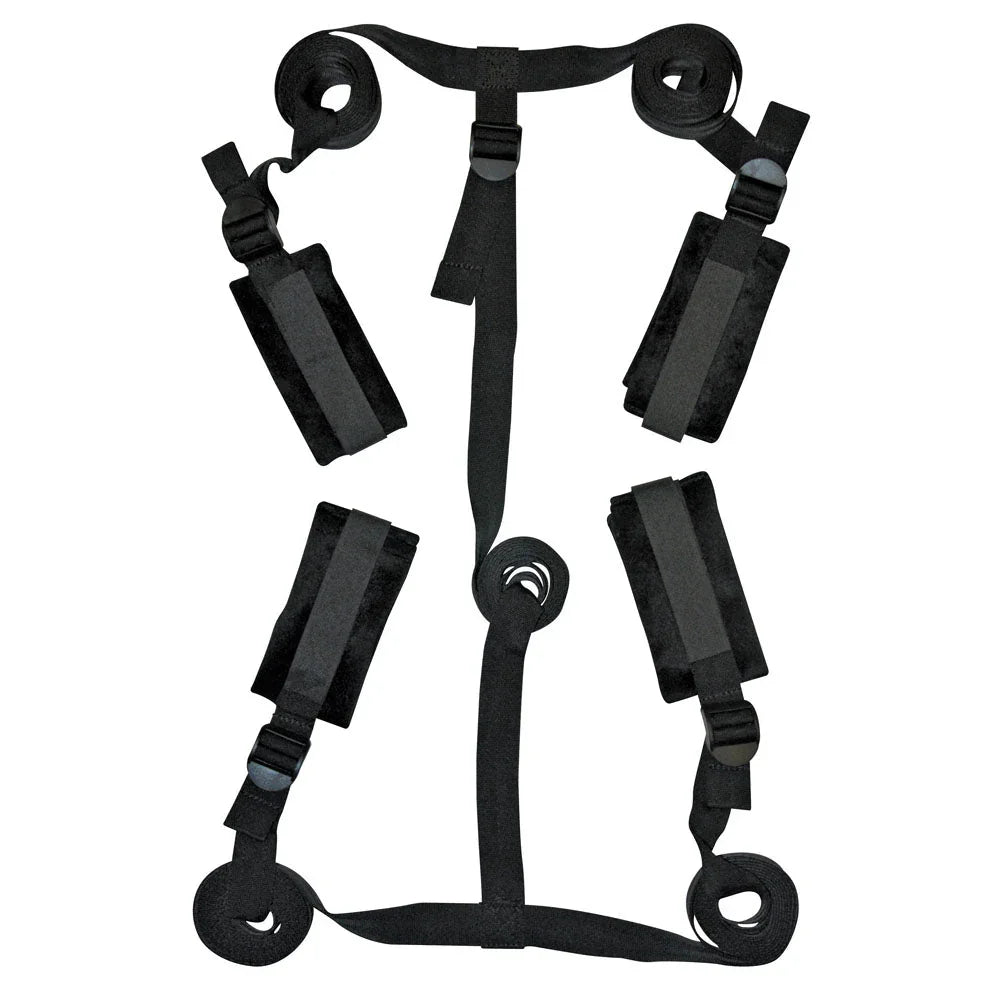 Under-bed strap system laid out flat with four cuffs and the centre connector