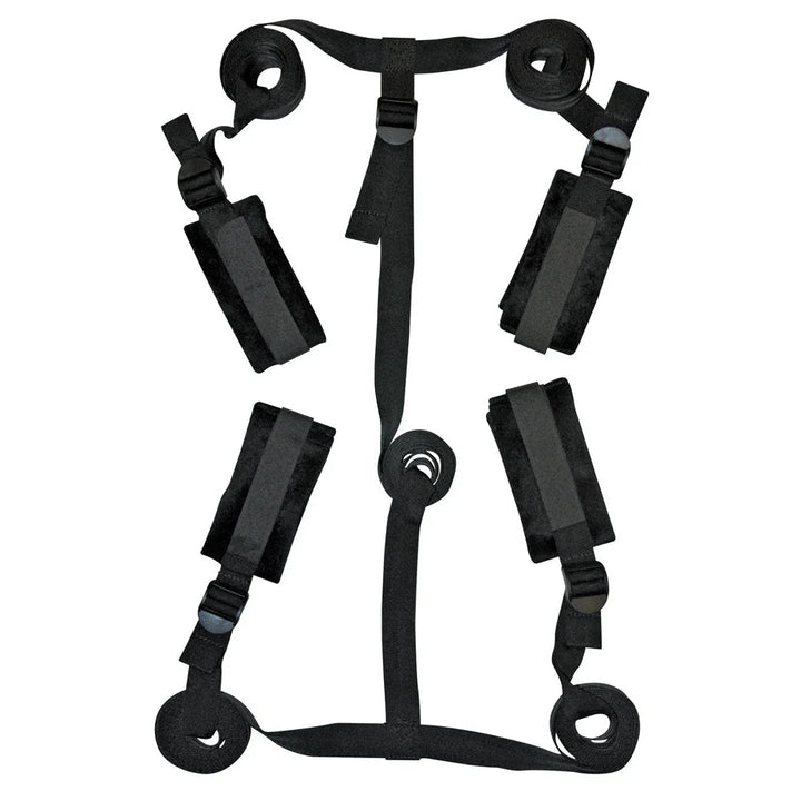Under-bed strap system laid out flat with four cuffs and the centre connector