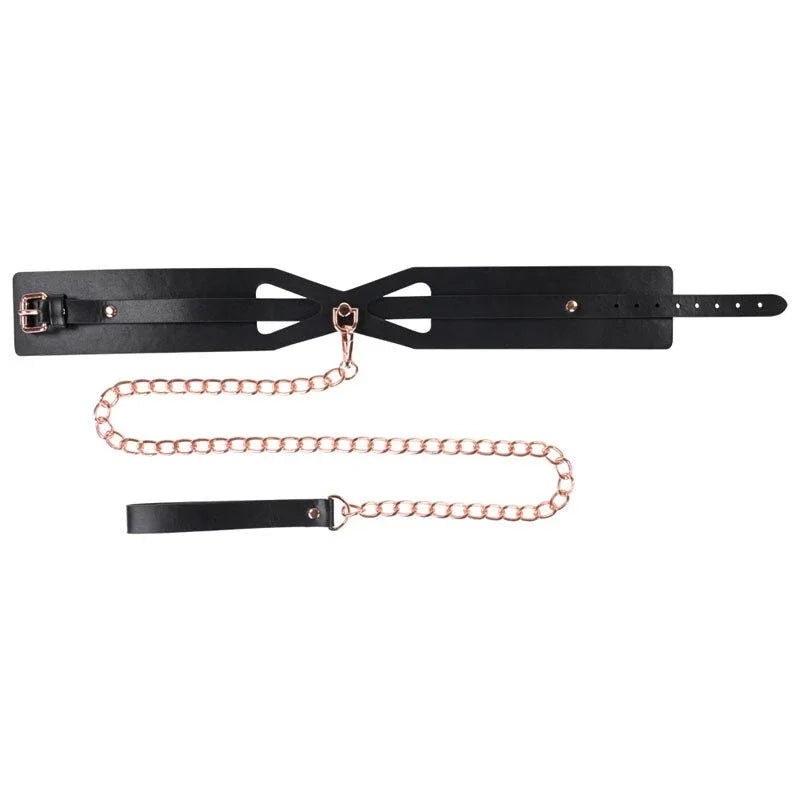 Brat collar laid flat showing the buckle and the rose gold chain leash