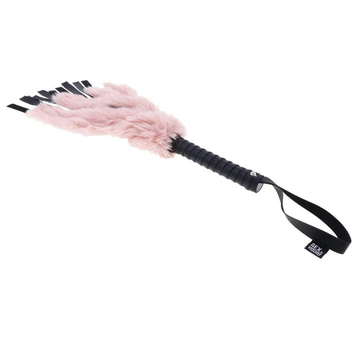 Sex & Mischief Brat Faux Fur Flogger - Black 50 cm Whip with Pink Faux Feather – Sex toys NZ by Naughtyhut. Discreet delivery nationwide.