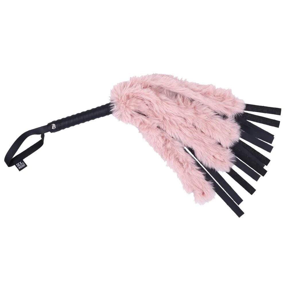 Sex & Mischief Brat Faux Fur Flogger - Black 50 cm Whip with Pink Faux Feather – Sex toys NZ by Naughtyhut. Discreet delivery nationwide.