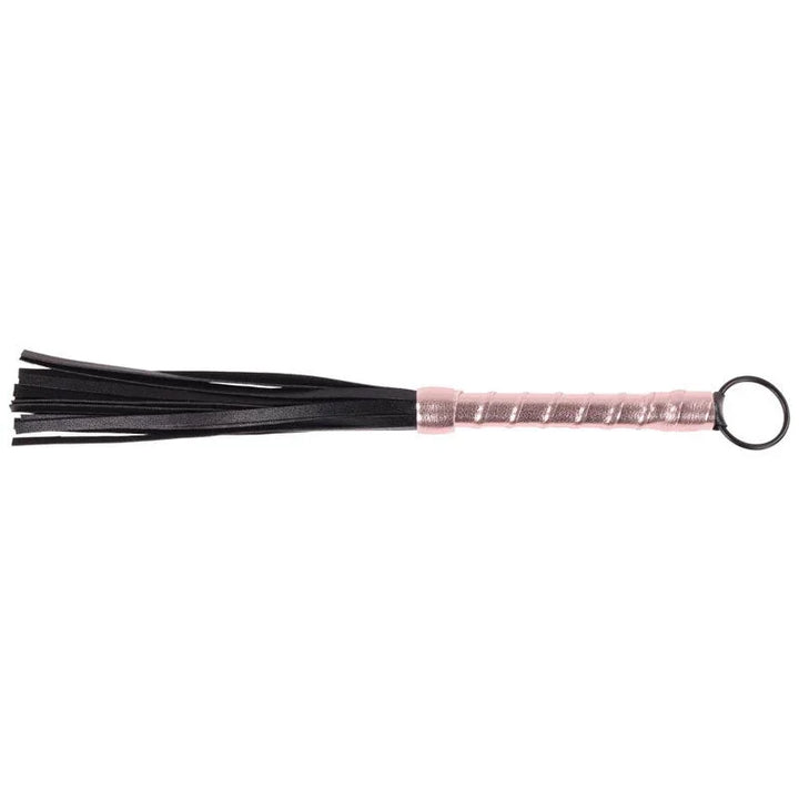 Brat mini flogger with black falls and a rose gold spiral handle