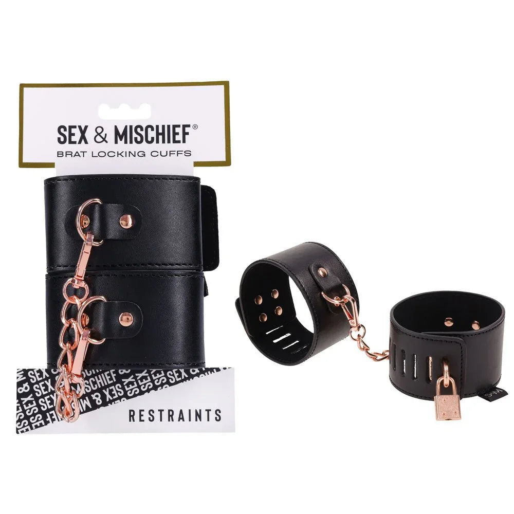 Sex & Mischief Brat Locking Cuffs on their card, black cuffs with rose gold padlocks