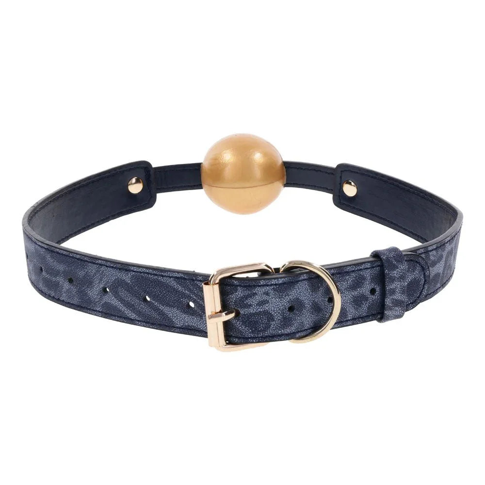 Cougar Ball Gag looped with the gold roller buckle turned to the front, gold ball at the top