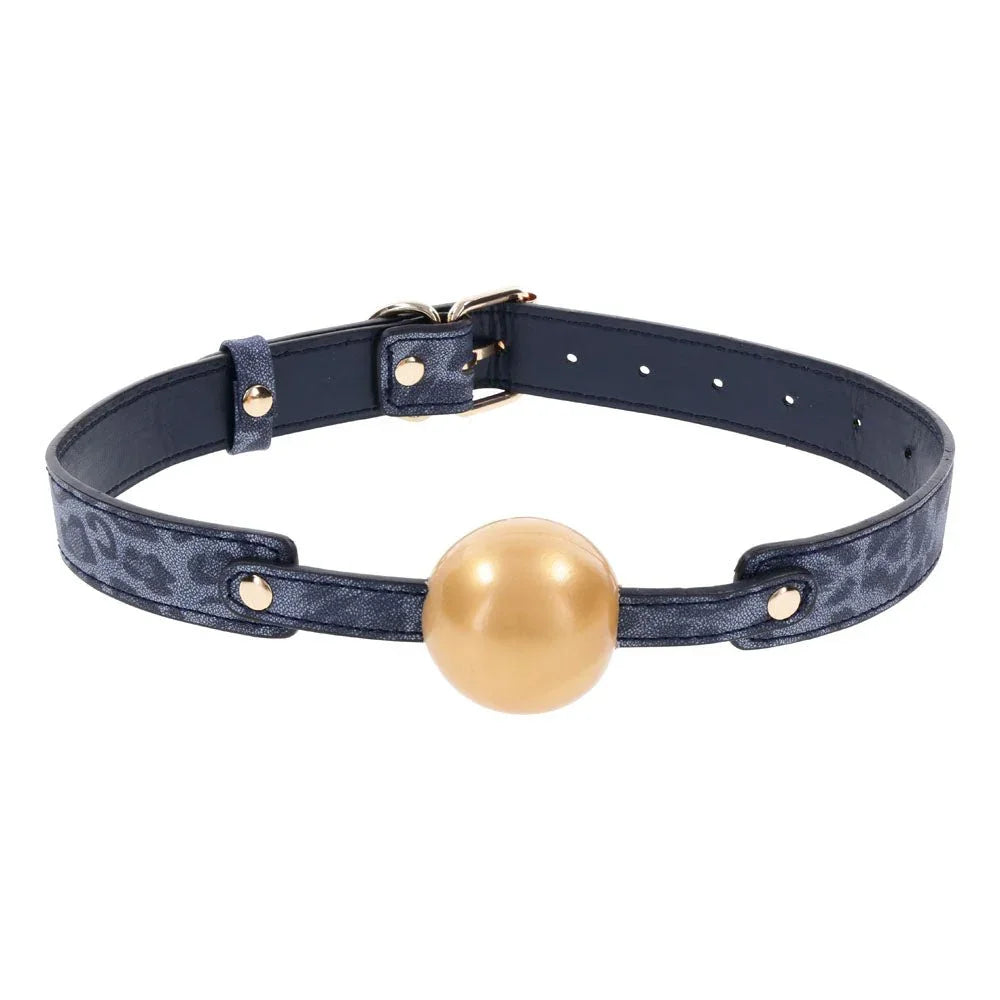 Cougar Ball Gag angled, showing the gold buckle and the strap keepers