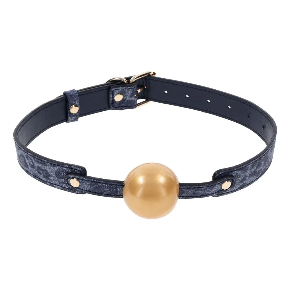 Sex & Mischief Cougar Ball Gag: gold ball on a navy leopard-print strap, front view
