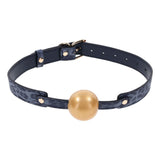 Buy Sex & Mischief Cougar Ball Gag - Navy Blue/Gold Mouth Restraint – Naughtyhut NZ sex toys online. Discreet delivery & top brands.
