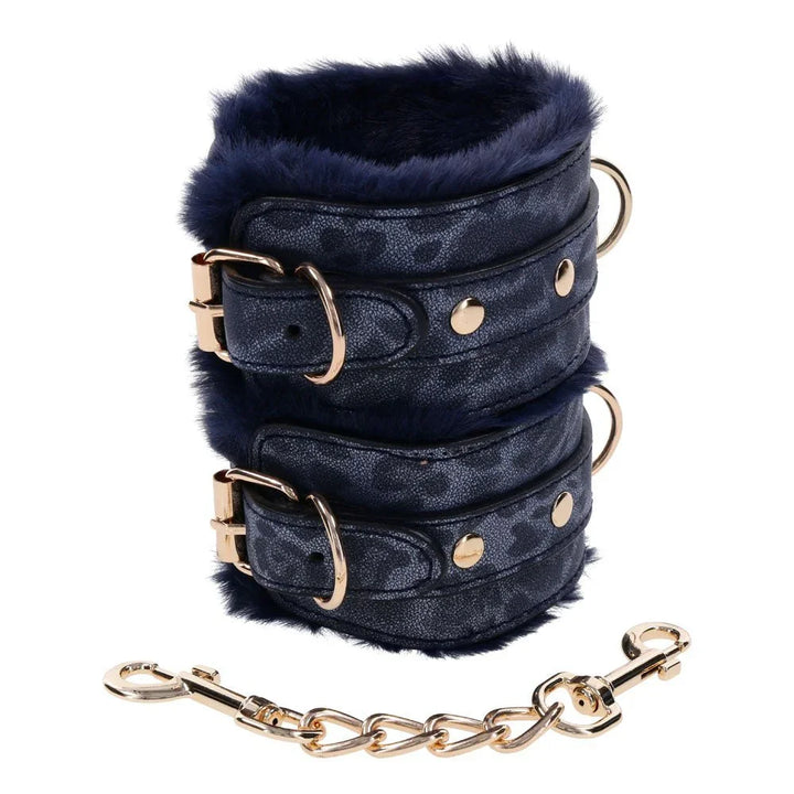 Sex & Mischief Cougar Fur Handcuffs stacked, navy leopard print with a gold chain