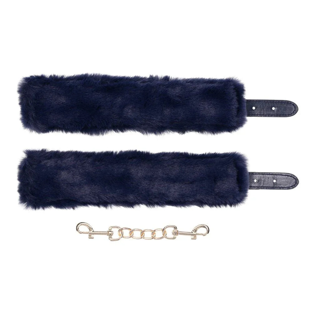 The two removable navy fur linings above the gold connecting chain