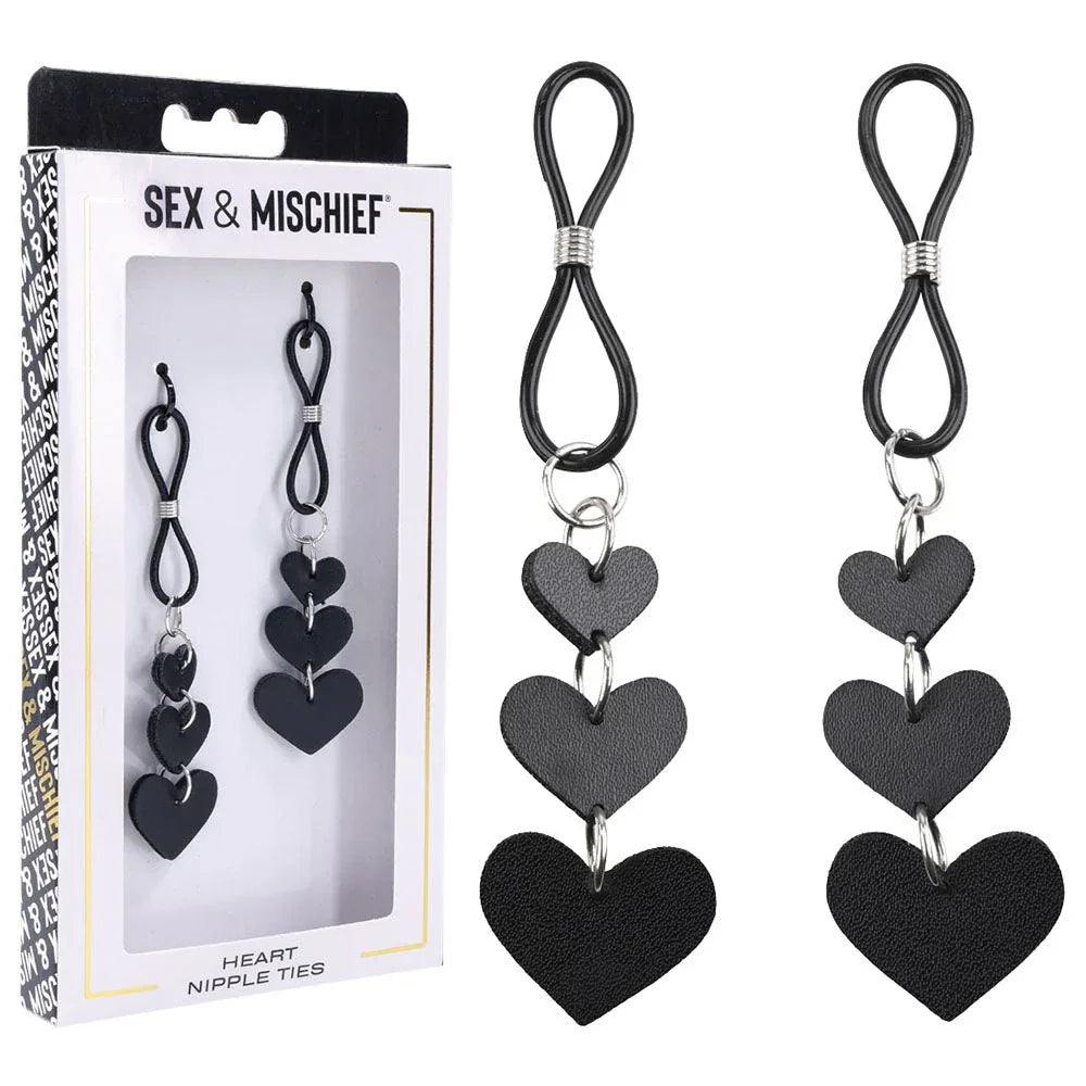 Sex & Mischief Heart Nipple Ties box beside the pair of black cord ties with heart charms