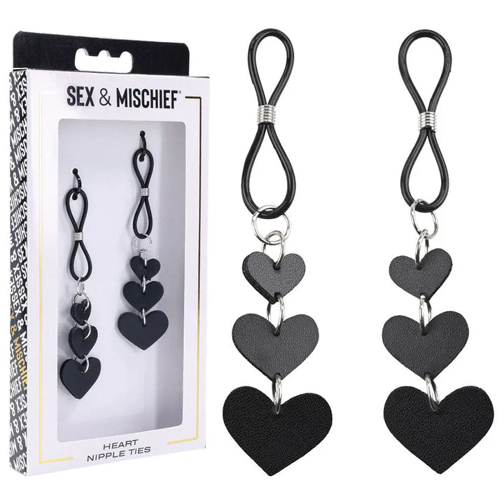 Sex & Mischief Heart Nipple Ties box beside the pair of black cord ties with heart charms