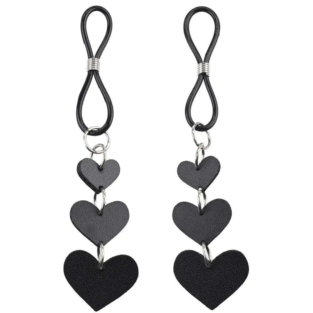 Pair of black nipple ties, each with three graduating faux-leather hearts