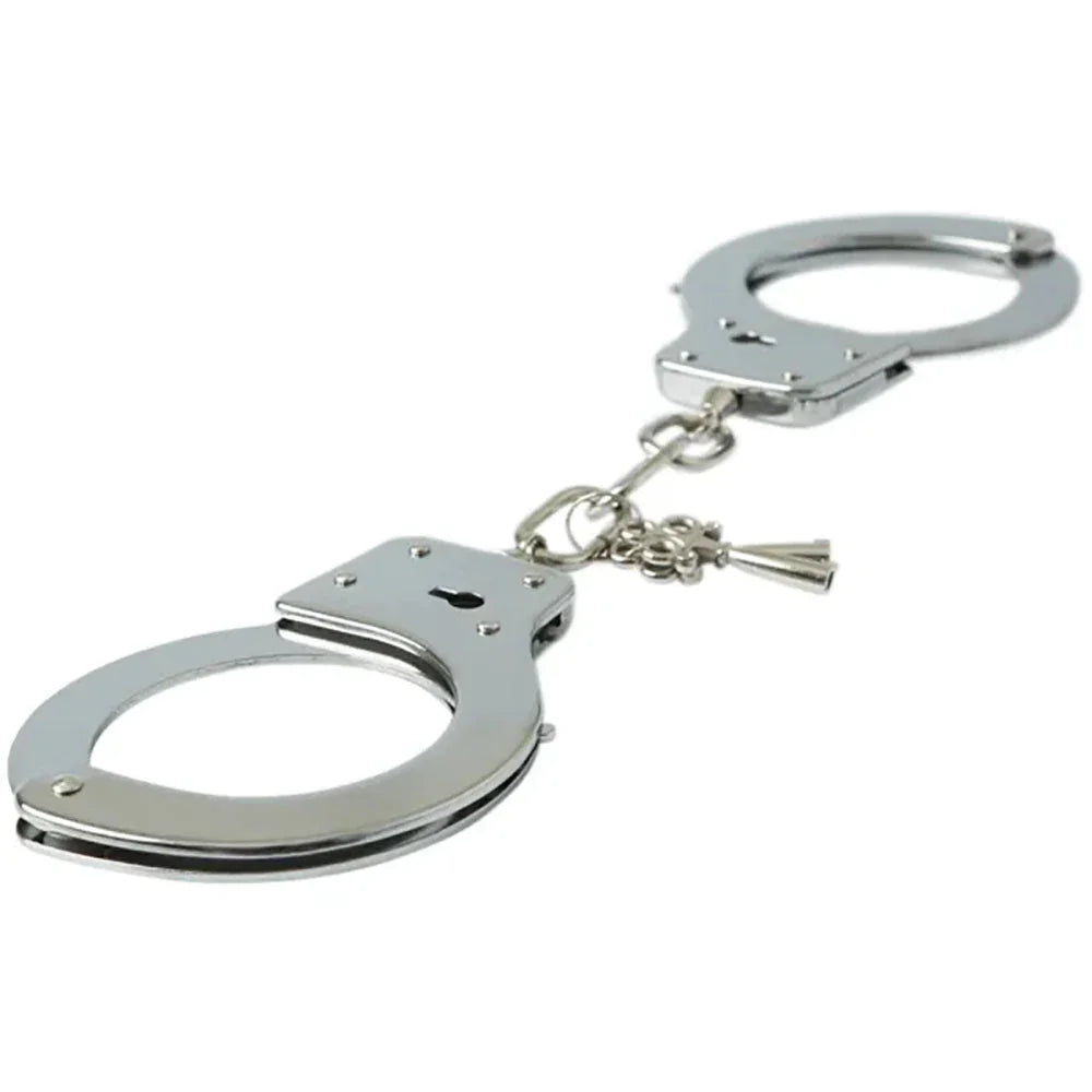 Chrome handcuffs with the keys hanging from the connecting chain