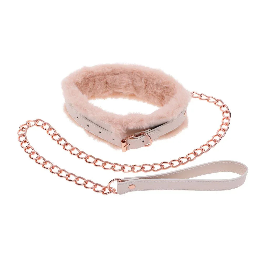 Peach fur collar with the rose gold chain leash sweeping out to the right