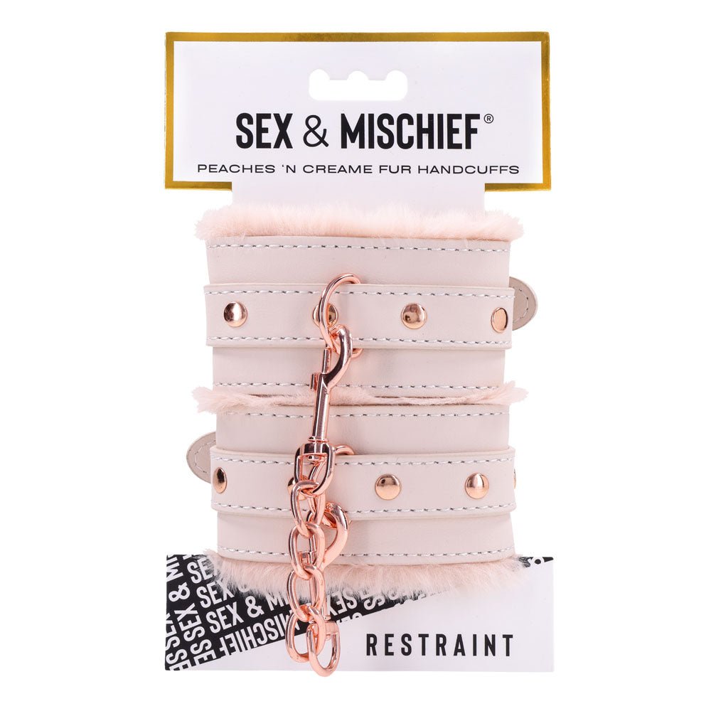 Buy Sex & Mischief Peaches n CreaMe Fur Handcuffs - Peach Restraints – Naughtyhut NZ sex toys online. Discreet delivery & top brands.