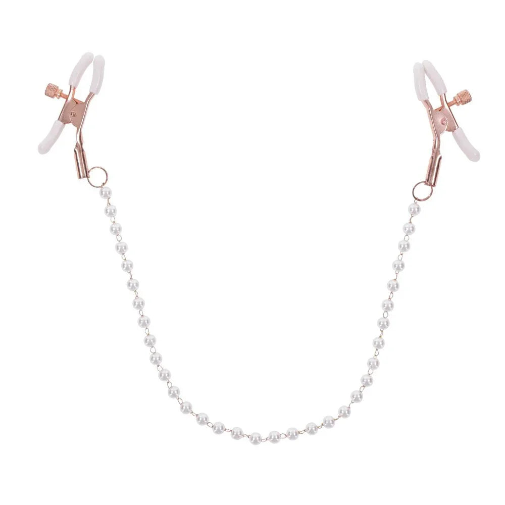 Pearl nipple clamps upright with the pearl chain hanging in a long curve