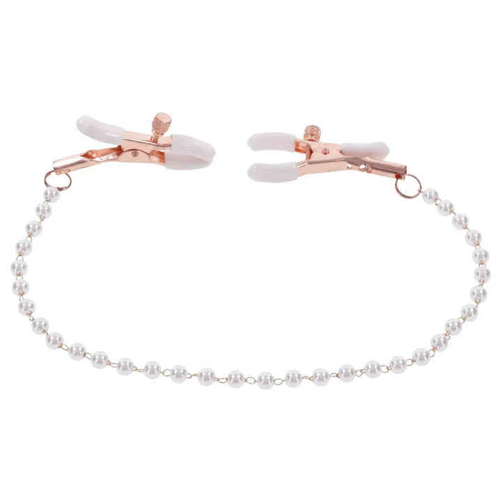 Pearl nipple clamps with the pearl chain forming an oval below them