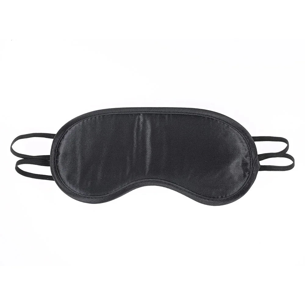 Black satin blindfold laid flat with its elastic head straps