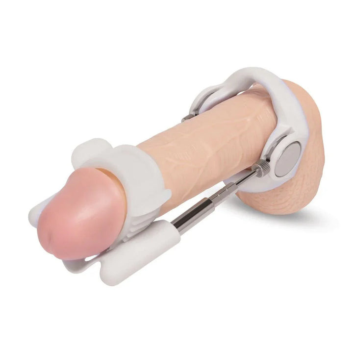 Size Up penis extender frame fitted to a flesh model, shown horizontally
