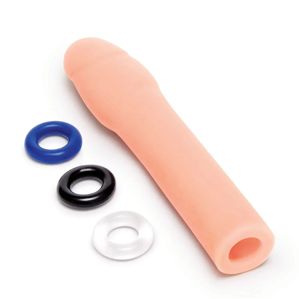 Size Up 2 inch extender lying diagonally, hollow open end towards the camera