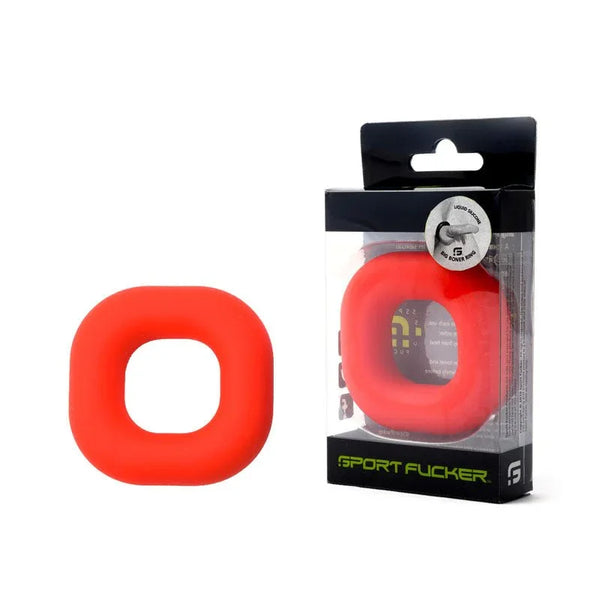 Sport Fucker Big Boner Ring in Red beside its clear retail box