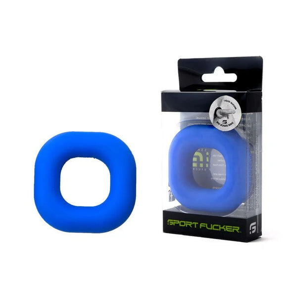 Sport Fucker Big Boner Ring in Blue beside its clear retail box