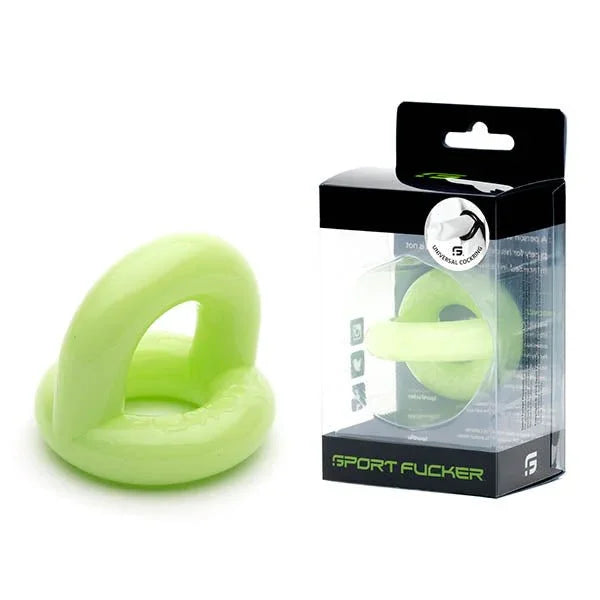 Sport Fucker Universal Cockring in glow-in-the-dark green beside its box