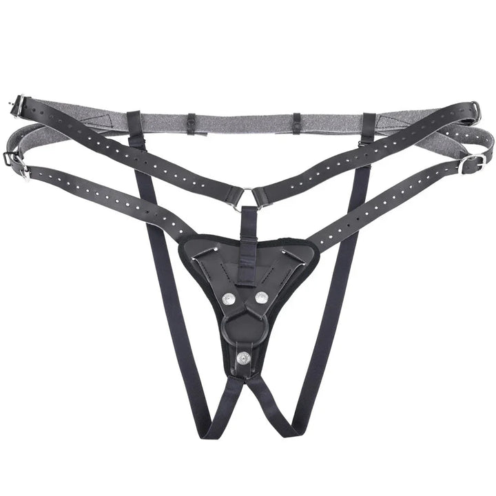 Aurora harness laid flat, showing the studded straps and O-ring front plate