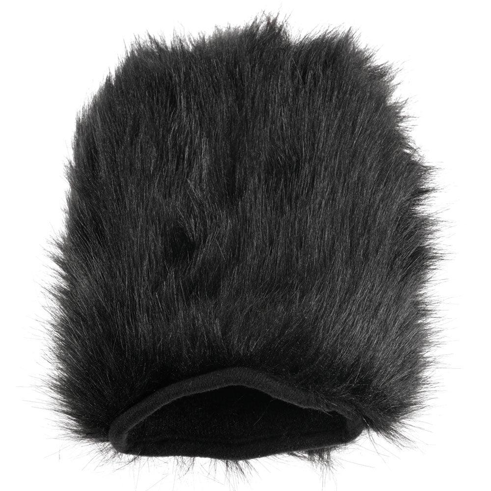 Black faux-fur Spiked Sensory Mitt standing alone on white