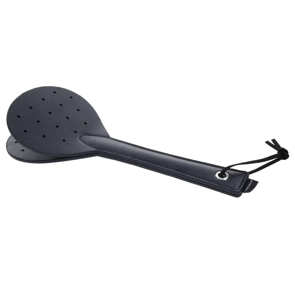 Swift Spanker angled to show the thickness of the blade and the studs