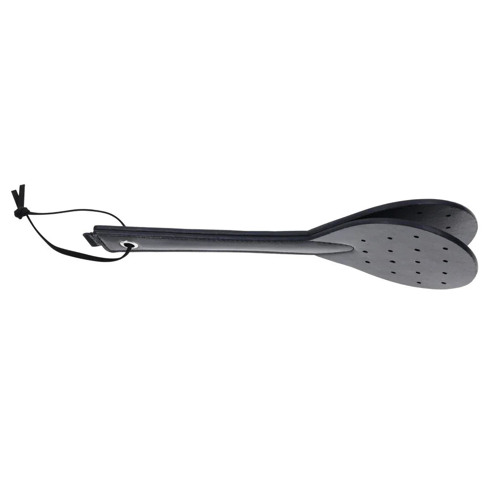 Swift Spanker laid out with the wrist cord at left and the studded blade at right