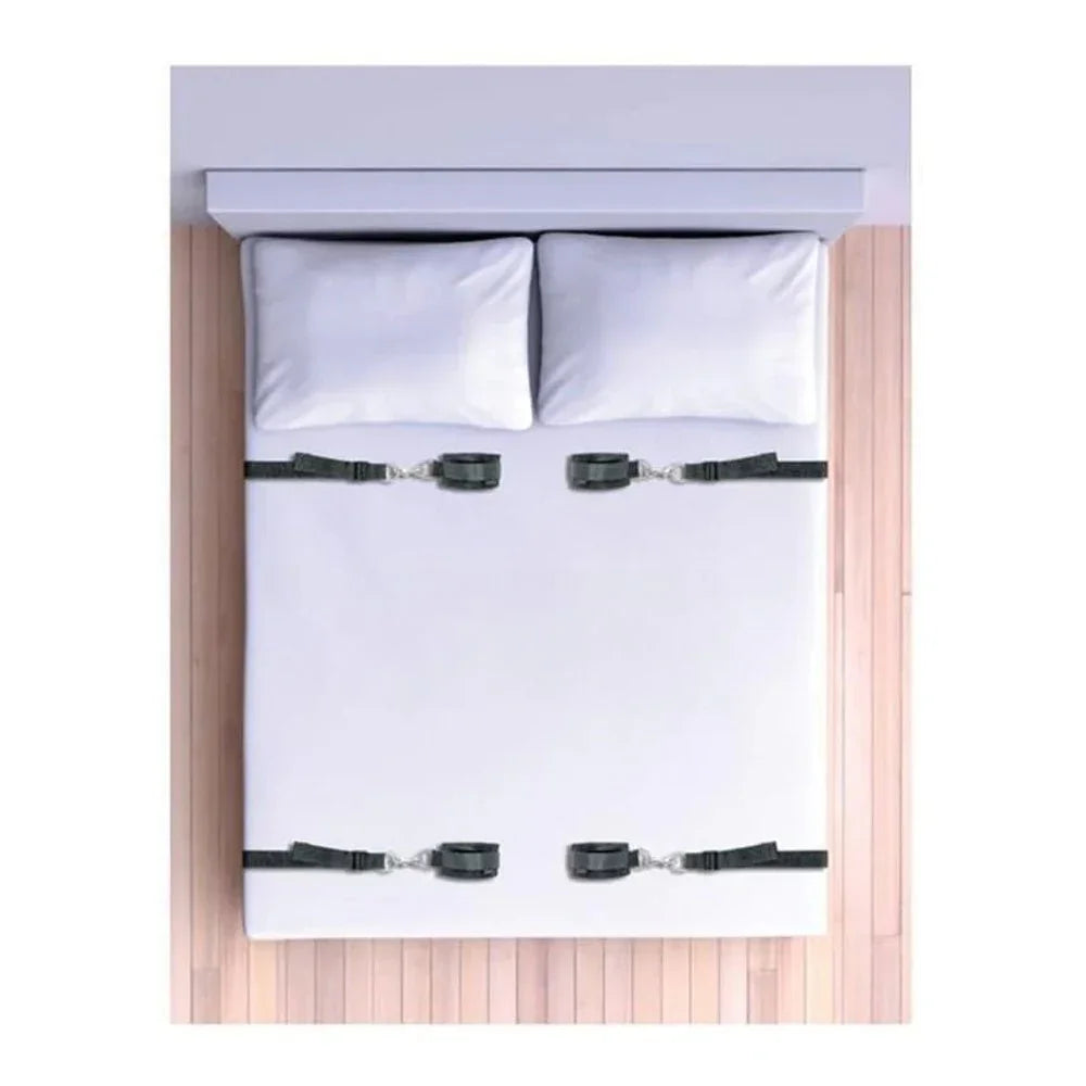 Overhead view of a bed with the four under-bed restraint cuffs in position