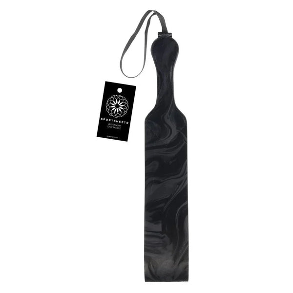 Sportsheets Velvet Noir Loop Paddle in marbled black, hanging by its wrist loop and tag