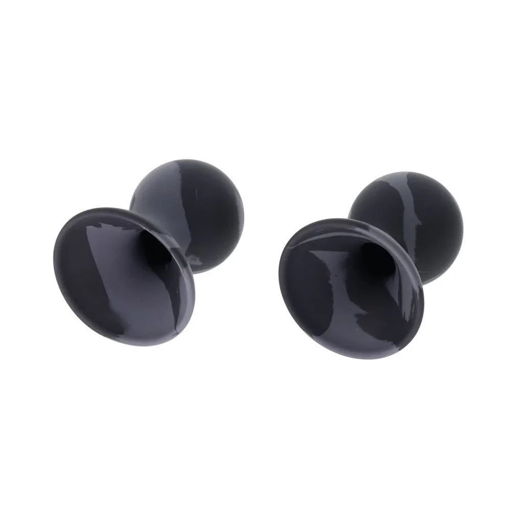 Nipple suckers tipped over to show the open silicone suction cups