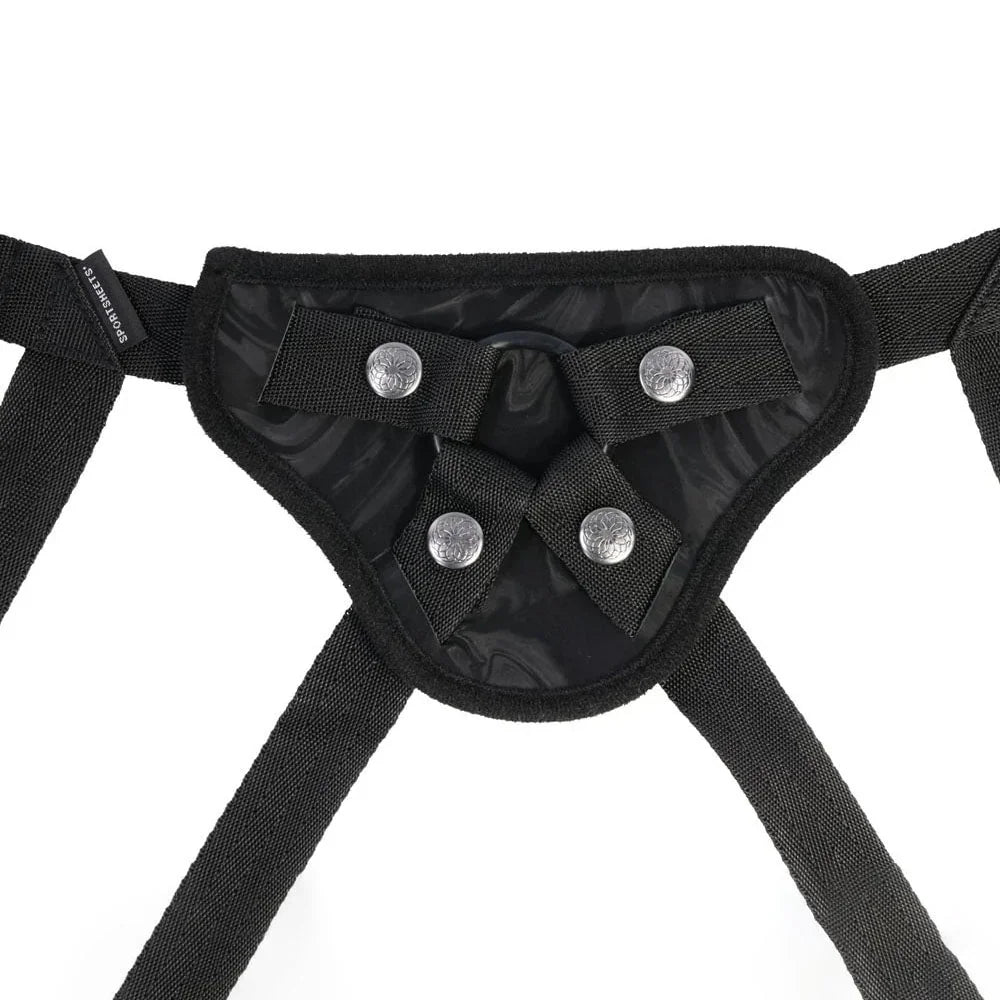 Close-up of the harness front panel with its four snaps and webbing straps