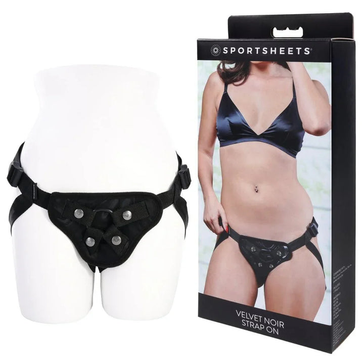 Sportsheets Velvet Noir Strap On harness on a mannequin form beside its box