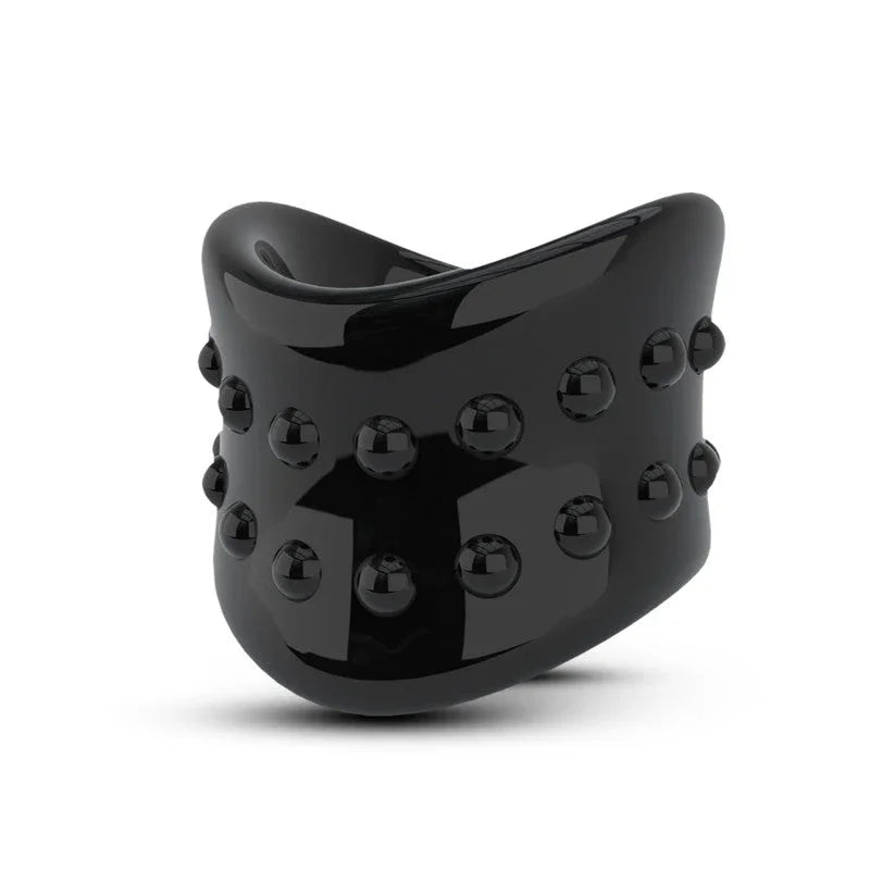 Black X Long ball stretcher on its own, showing the raised studs around the band
