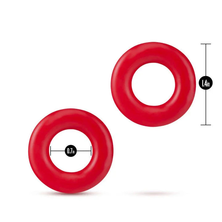 Two red Stay Hard Donut Rings with measurements, 0.7in opening and 1.4in outer width