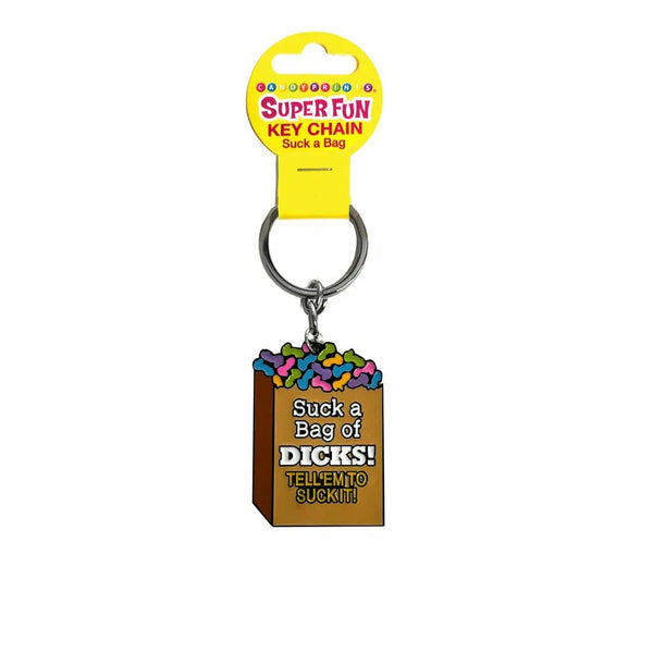 Suck A Bag Of Dicks keychain, printed candy-bag charm on its Super Fun card