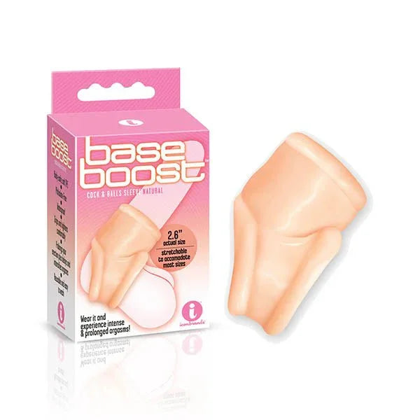 The 9's Base Boost cock and ball sleeve in Flesh beside its pink retail box