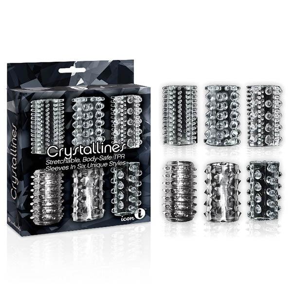 The 9's Crystallines retail box beside six clear textured cock sleeves in two rows