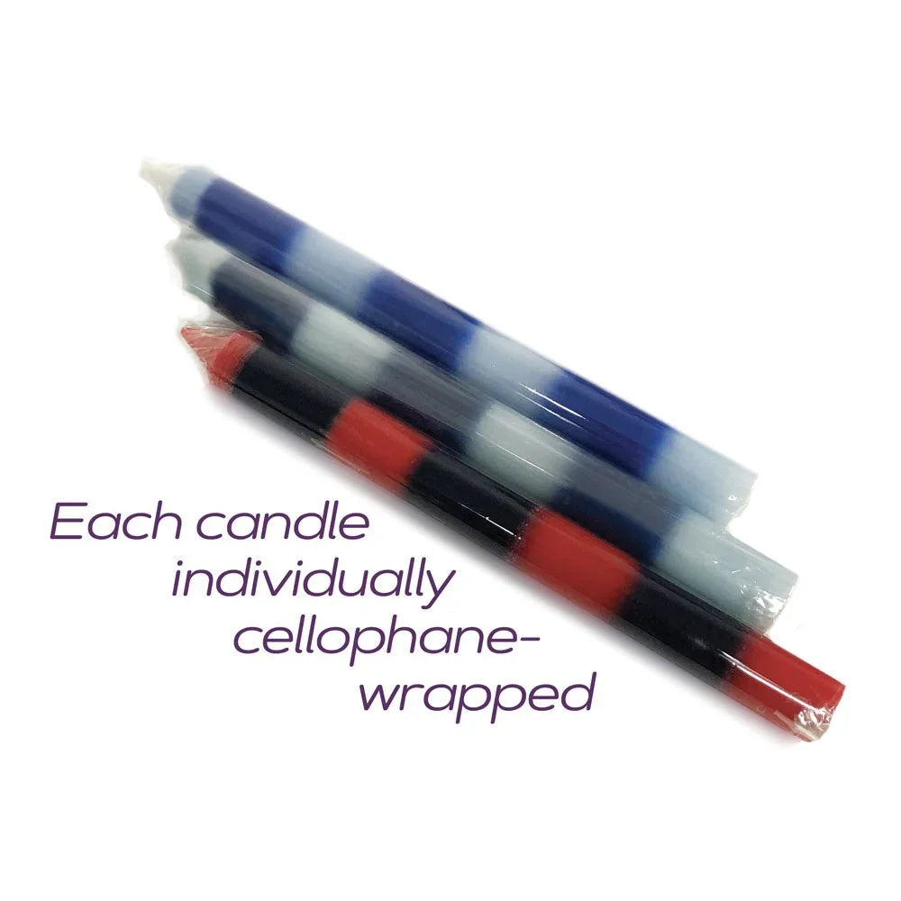 The three Passionettes candles lying cellophane-wrapped, captioned individually wrapped