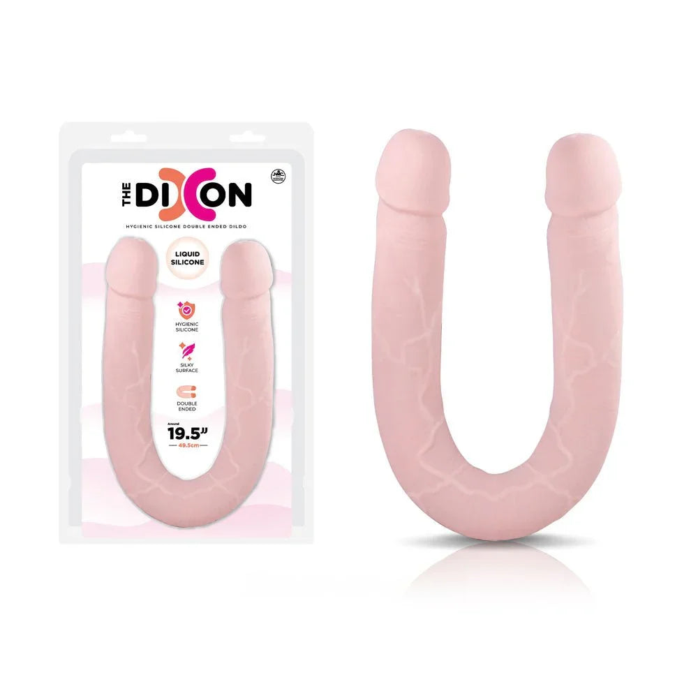 The Dixon 50 cm double dong in Flesh, U-shaped silicone beside its blister pack