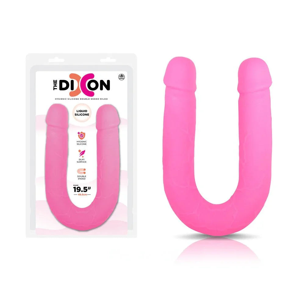 The Dixon 50 cm double dong in Pink, twin-ended U shape beside its blister pack