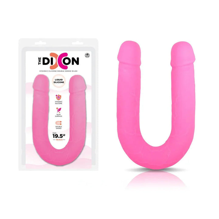 The Dixon 50 cm double dong in Pink, twin-ended U shape beside its blister pack