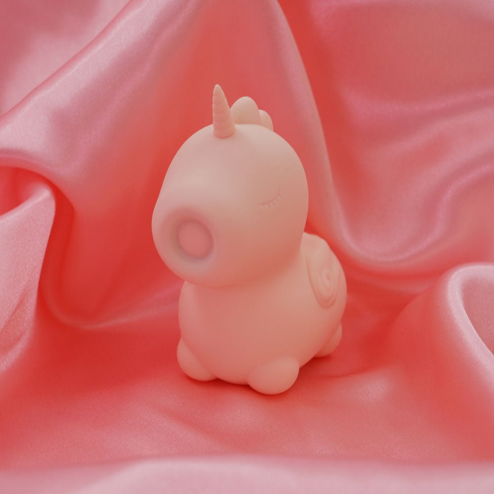 Unihorn - Heart Throb - Coral USB Rechargeable Flicking Stimulator – Sex toys NZ by Naughtyhut. Discreet delivery nationwide.