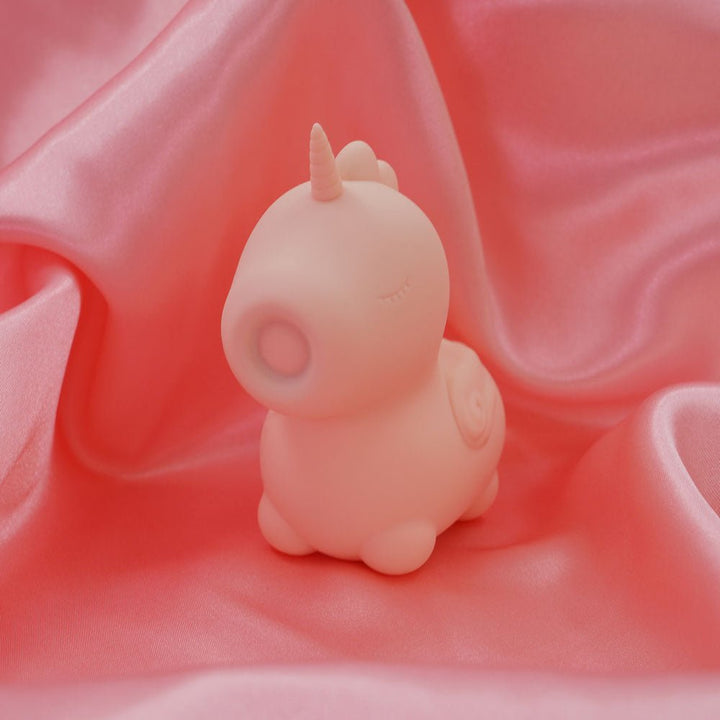 Unihorn - Heart Throb - Coral USB Rechargeable Flicking Stimulator – Sex toys NZ by Naughtyhut. Discreet delivery nationwide.