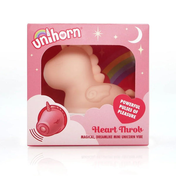 Unihorn Heart Throb stimulator in Coral, boxed with rainbow window