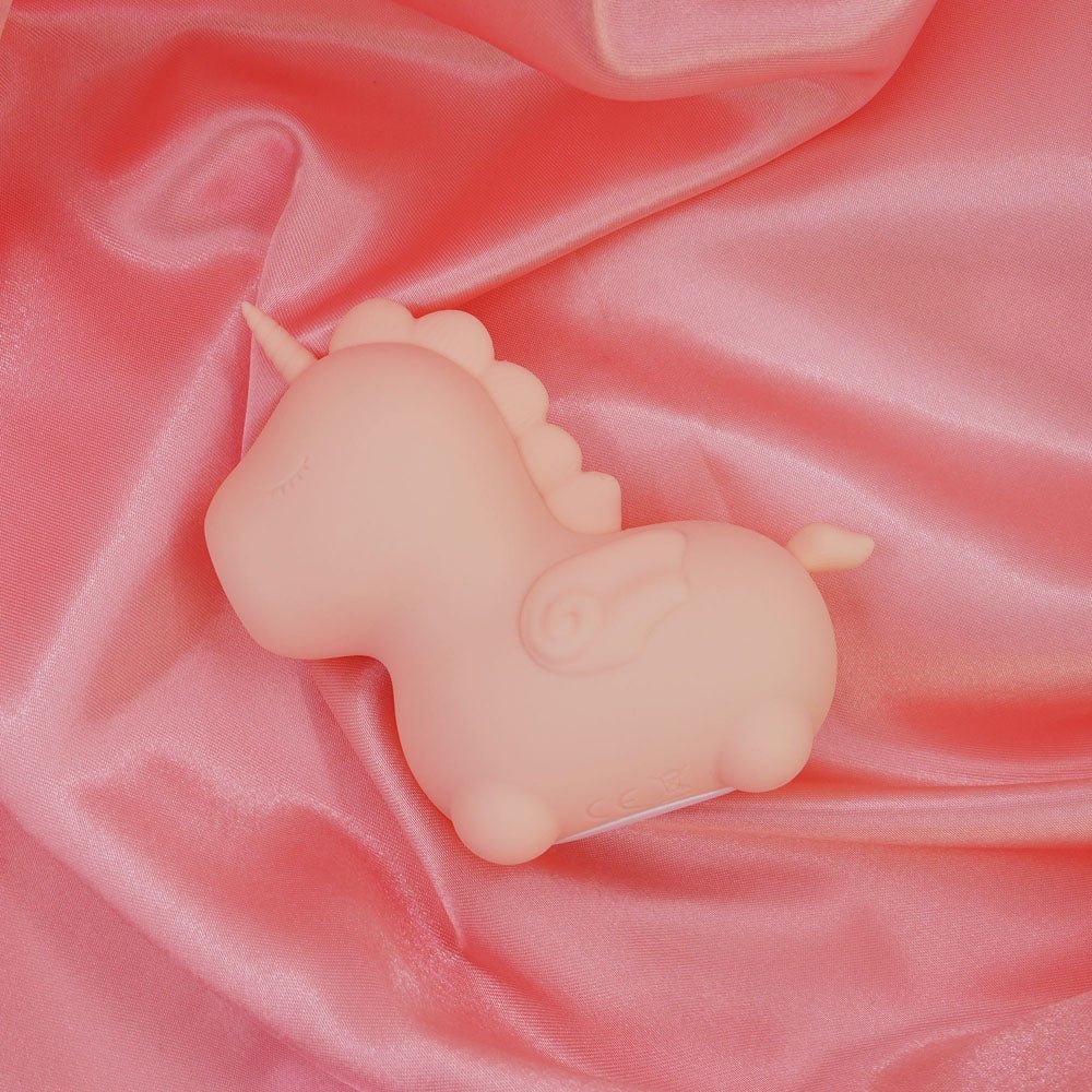 Unihorn - Heart Throb - Coral USB Rechargeable Flicking Stimulator – Sex toys NZ by Naughtyhut. Discreet delivery nationwide.