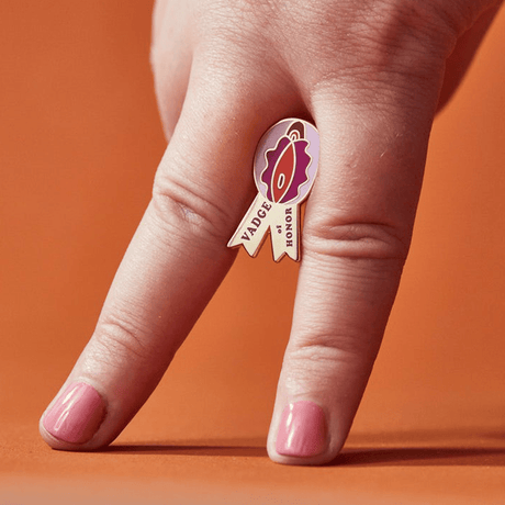Buy Vadge Of Honor Enamel Pin – Naughtyhut NZ sex toys online. Discreet delivery & top brands.